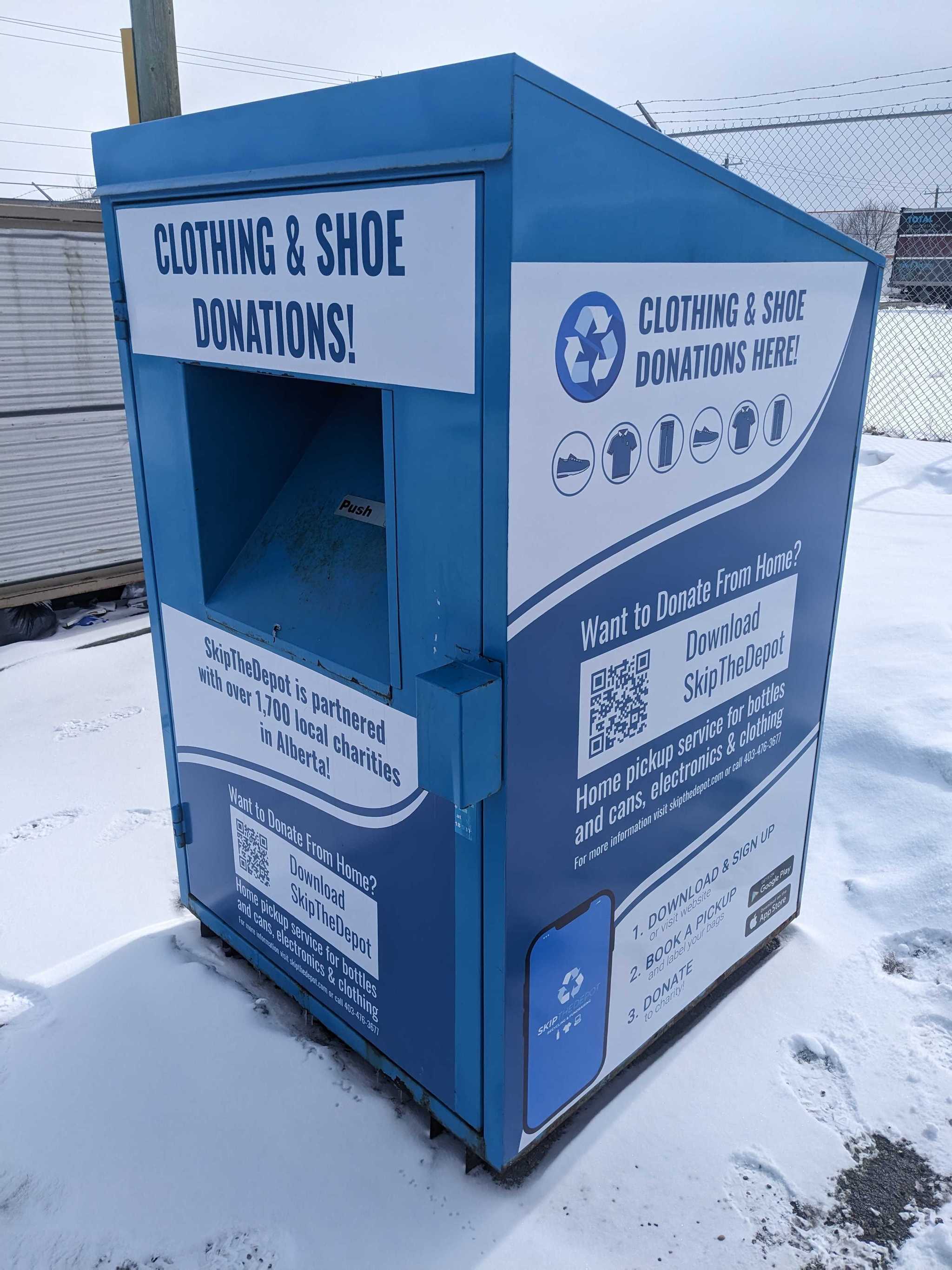 Image depicting one clothing donation bin on it's own.