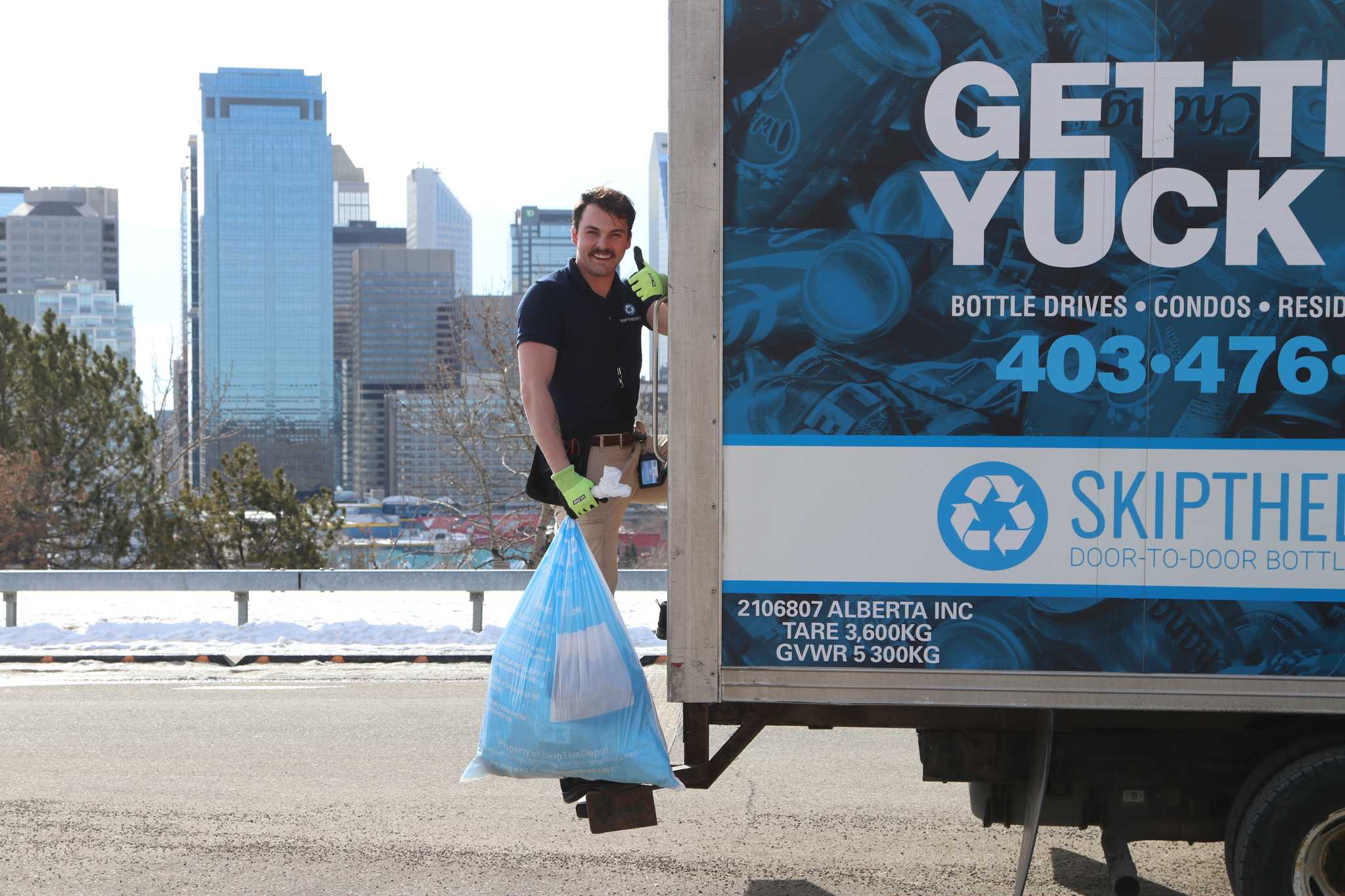 SkipTheDepot driver picking up a home bottle pickup to be donated to wildfire relief efforts in Jasper.