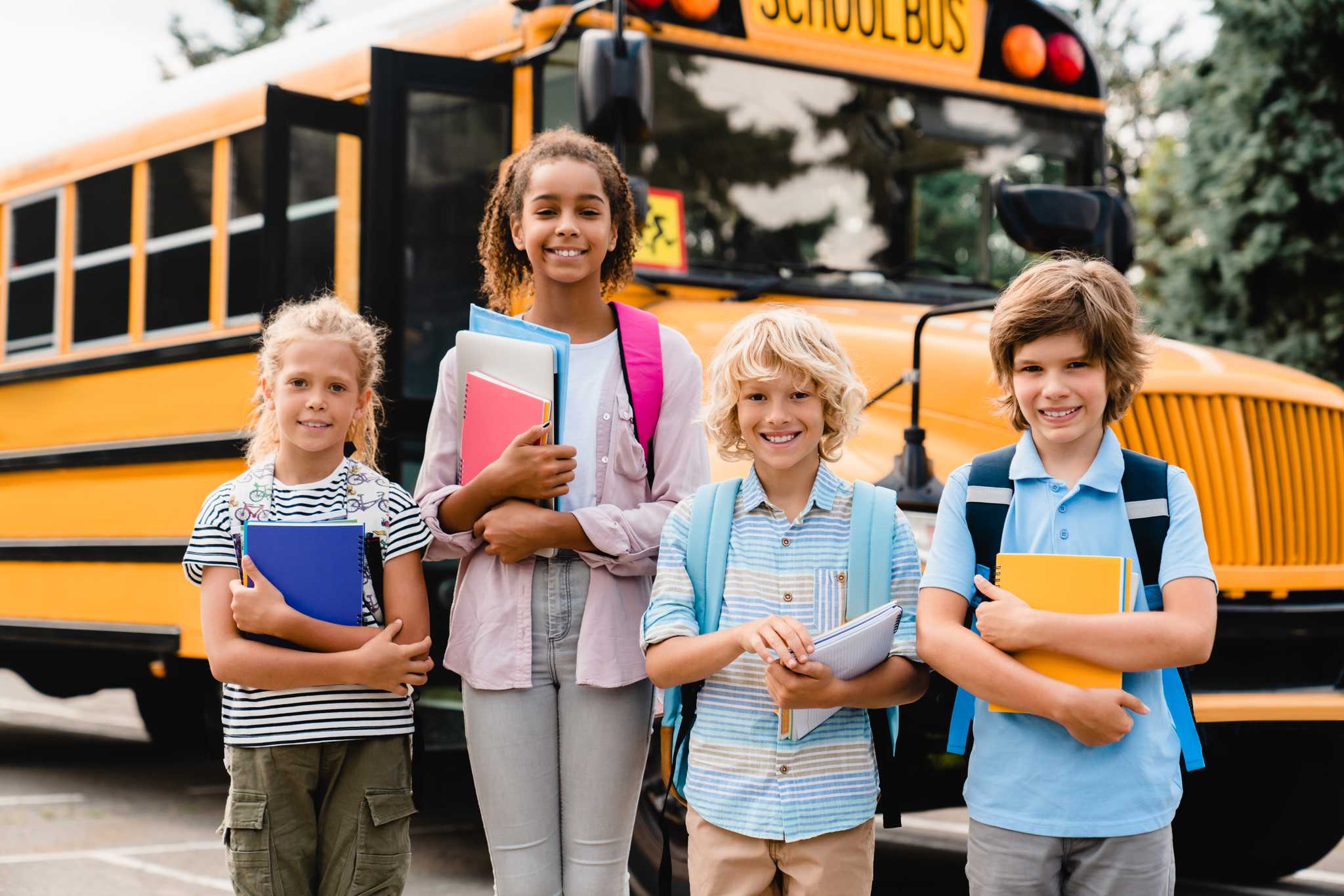 Children with school supplies purchased with money generated through school fundraising with SkipTheDepot. 